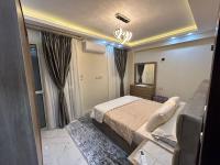 Postel nebo postele na pokoji v ubytování Apartment Hossam - Hurghada