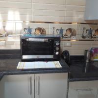 Kuchyň nebo kuchyňský kout v ubytování Apartment Hossam - Hurghada