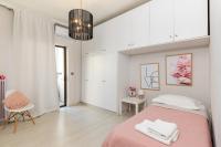 Łóżko lub łóżka w pokoju w obiekcie Chania dream apartment
