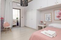 Łóżko lub łóżka w pokoju w obiekcie Chania dream apartment