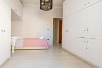 Łóżko lub łóżka w pokoju w obiekcie Chania dream apartment