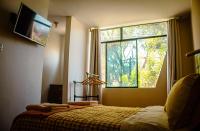 Del Valle Houseにあるベッド