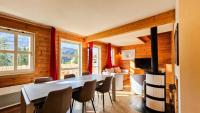 Część wypoczynkowa w obiekcie Résidence Hameau - Chalet confortable · Poêle à bois · Terrasse · Garage MAE-8714