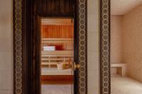 Sharq Village & Spa, a Ritz-Carlton Hotelにあるベッド