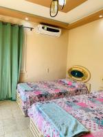 Postel nebo postele na pokoji v ubytování شقة الأحلام بإطلالة وجلسة راقية