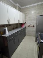 Kuchyň nebo kuchyňský kout v ubytování Apartment in jannet zayed 2
