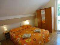 Posteľ alebo postele v izbe v ubytovaní Apartment Maria
