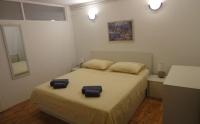 Posteľ alebo postele v izbe v ubytovaní Apartment Maria