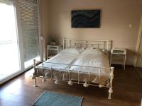 Posteľ alebo postele v izbe v ubytovaní Crystal Spas Apartman-Balaton
