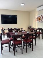 ArrozalにあるSeleto Hotel Fazendaのカンファレンスルーム(テーブル、椅子、薄型テレビ付)