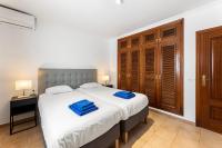 Postel nebo postele na pokoji v ubytování Lanzarote Villa Volcan 7