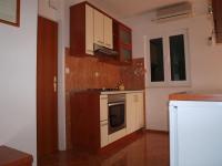 Kuchyň nebo kuchyňský kout v ubytování Apartments Mia