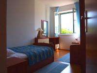 Postel nebo postele na pokoji v ubytování Apartments Mia