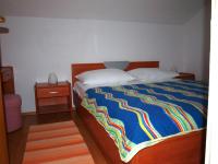 Postel nebo postele na pokoji v ubytování Apartments Mia