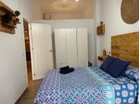 Posteľ alebo postele v izbe v ubytovaní Apartamento El Olivo Vejer