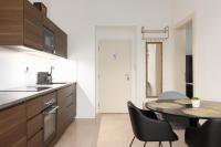 Kuchyň nebo kuchyňský kout v ubytování Tichý apartmán v centru města u metra s balkónem a parkováním