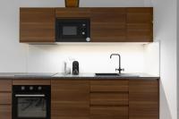 Kuchyň nebo kuchyňský kout v ubytování Tichý apartmán v centru města u metra s balkónem a parkováním