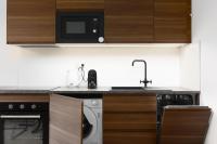 Kuchyň nebo kuchyňský kout v ubytování Tichý apartmán v centru města u metra s balkónem a parkováním