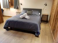 Posteľ alebo postele v izbe v ubytovaní Chalet Les Cochettes
