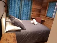 Posteľ alebo postele v izbe v ubytovaní Chalet Les Cochettes