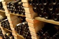 a bunch of wine bottles in a wine cellar at Hotel Ristorante Da Tullio in Tarzo