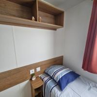 Posteľ alebo postele v izbe v ubytovaní Mobil home 6 à 8 personnes SANS Fun Pass