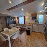 Kuchyňa alebo kuchynka v ubytovaní Mobil home 6 à 8 personnes SANS Fun Pass