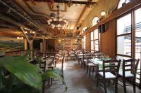 Un restaurant sau alt loc unde se poate mânca la Z8 Prémium Apartman