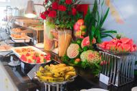a buffet with bananas and other fruits and vegetables at ELC Luxury Đà Lạt in Da Lat