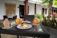 a table with three plates of food on it at Swanee Grand in Negombo