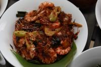 a plate of food with shrimp in a sauce at Swanee Grand in Negombo