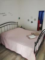 Postel nebo postele na pokoji v ubytování Apartments Mirela