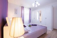 Posteľ alebo postele v izbe v ubytovaní Apartments J&J