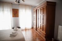 A bed or beds in a room at Casa La Sinagoga de Trujillo