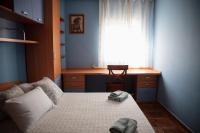 A bed or beds in a room at Casa La Sinagoga de Trujillo