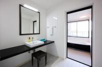 Hotel & Villa Seahorse MIYAKOJIMAにあるベッド