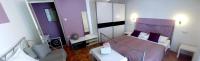 Postel nebo postele na pokoji v ubytování Apartments Jadra