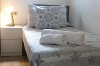 Postel nebo postele na pokoji v ubytování DELUX apartament Salou