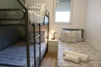 Postel nebo postele na pokoji v ubytování DELUX apartament Salou