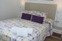 Postel nebo postele na pokoji v ubytování DELUX apartament Salou