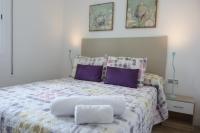 Postel nebo postele na pokoji v ubytování DELUX apartament Salou