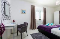 Postel nebo postele na pokoji v ubytování Apartment Jurica