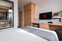Keypad Hotel - Linh Langにあるテレビまたはエンターテインメントセンター