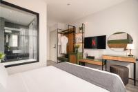 Keypad Hotel - Linh Langにあるテレビまたはエンターテインメントセンター