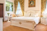 Posteľ alebo postele v izbe v ubytovaní Palace Hotel Polom
