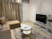 TV a/nebo společenská místnost v ubytování Two bedroom apartment in madinaty