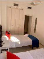 A bed or beds in a room at Apartamento Torre de la Plata