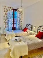 A bed or beds in a room at Apartamento Torre de la Plata