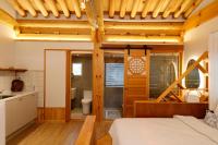 Ein Bett oder Betten in einem Zimmer der Unterkunft Hanok stay Mokhyang