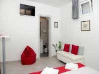 Televízia a/alebo spoločenská miestnosť v ubytovaní Apartment Onyx